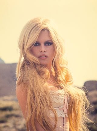 Sance photo entre deux scènes sur le tournage de Viva Maria au Mexique.